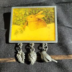 1999 Marjolein Bastin Brooch Framed Epoxy Rabbit in Snow Dangling Charms  1.75"