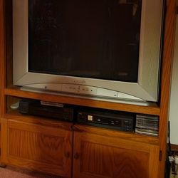 Panasonic tv and oak cabinet 