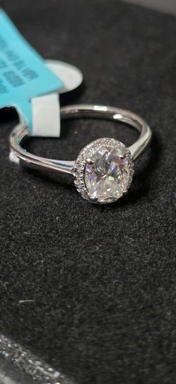 Size 8 moissanite halo engagement style ring