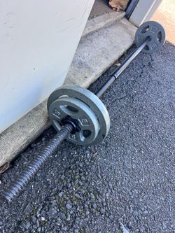 BARBELL BAR WEIGHT ONE INCH HOLE  55 LB  IN GOOD CONDITION