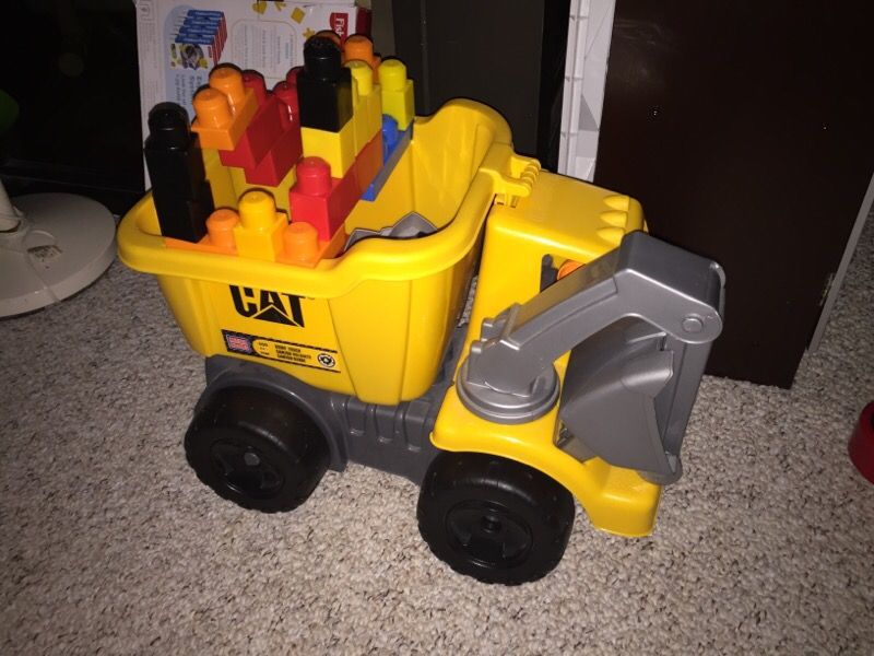 Cat tonka dump truck with large Lego blocks