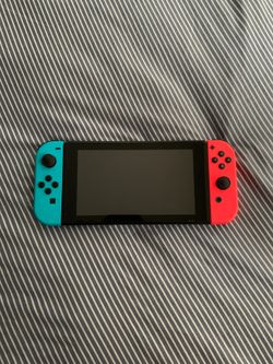 Nintendo Switch with red and blue joy cons