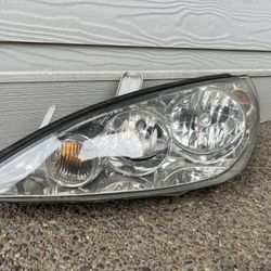 Headlight 05-06 Toyota Camry driver side 