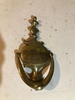 Brass door knocker.