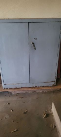 Locking metal cabinet
