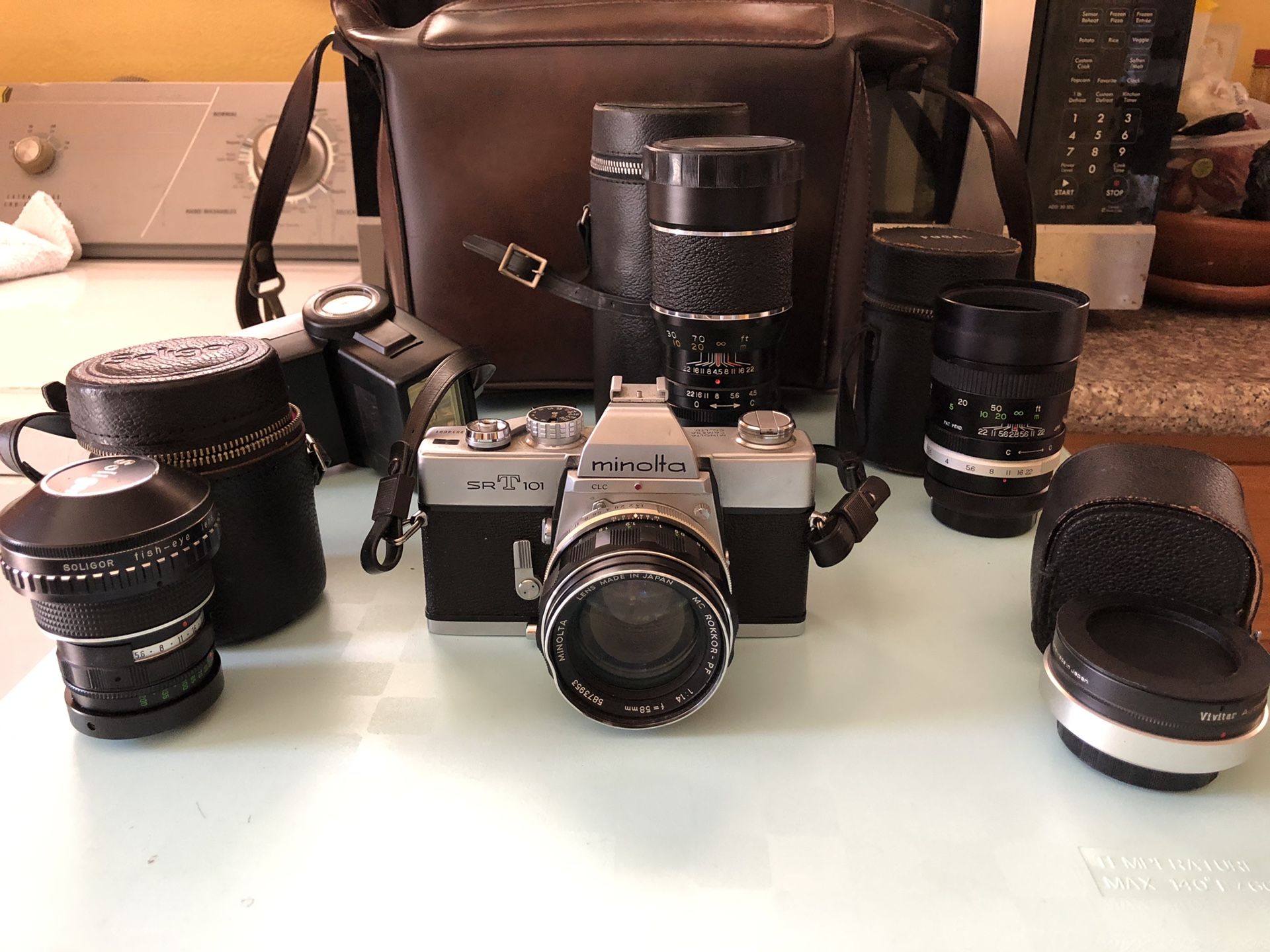Minolta SRT 101 Vintage Camera 📷 with 5 Lenses, Flash, and Leather Bag