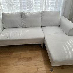 White faux leather couch
