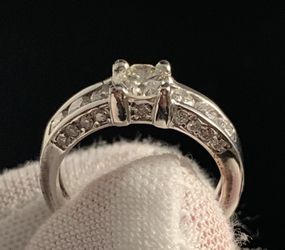 0.65 ct. round diamond in 14 KWG beautiful ring.