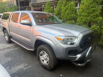 Silver Toyota Tacoma Truck with Cap year  2020