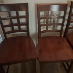 4 Nice Wooden  chairs