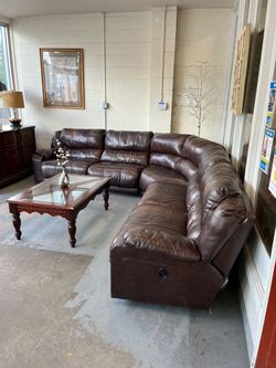 Brown leather recliner sectional couch (in store)