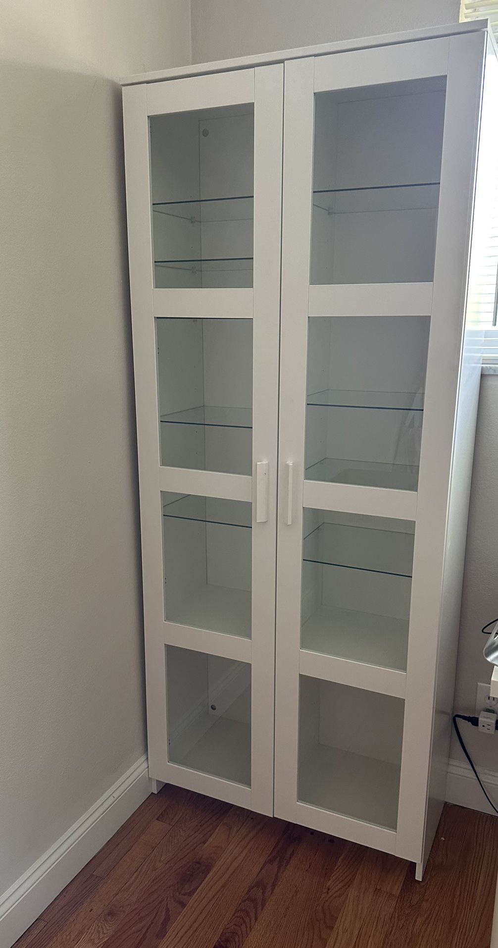 Beautiful White brimnes cabinet With Glass Shelves And Doors!