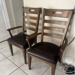 Pair Of Solid Wood Arm Chairs