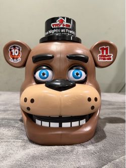 Five Nights at Freddy’s 10th Anniversary Freddy Surprise Head w/ 3 Plush – Works