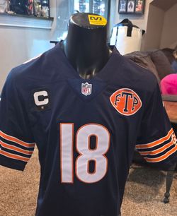 Chicago Bears Rivalry Custom "FTP"Custom Chicago Bears fan gear featuring a special anti-rivalry patch on the shoulder.
Player: Caleb Williams (#18)
