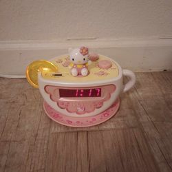 Vintage HELLO KITTY Teacup alarm clock with lemon light.