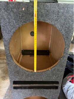 charcoal gray speaker enclosure designed for dual 12-inch subwoofers