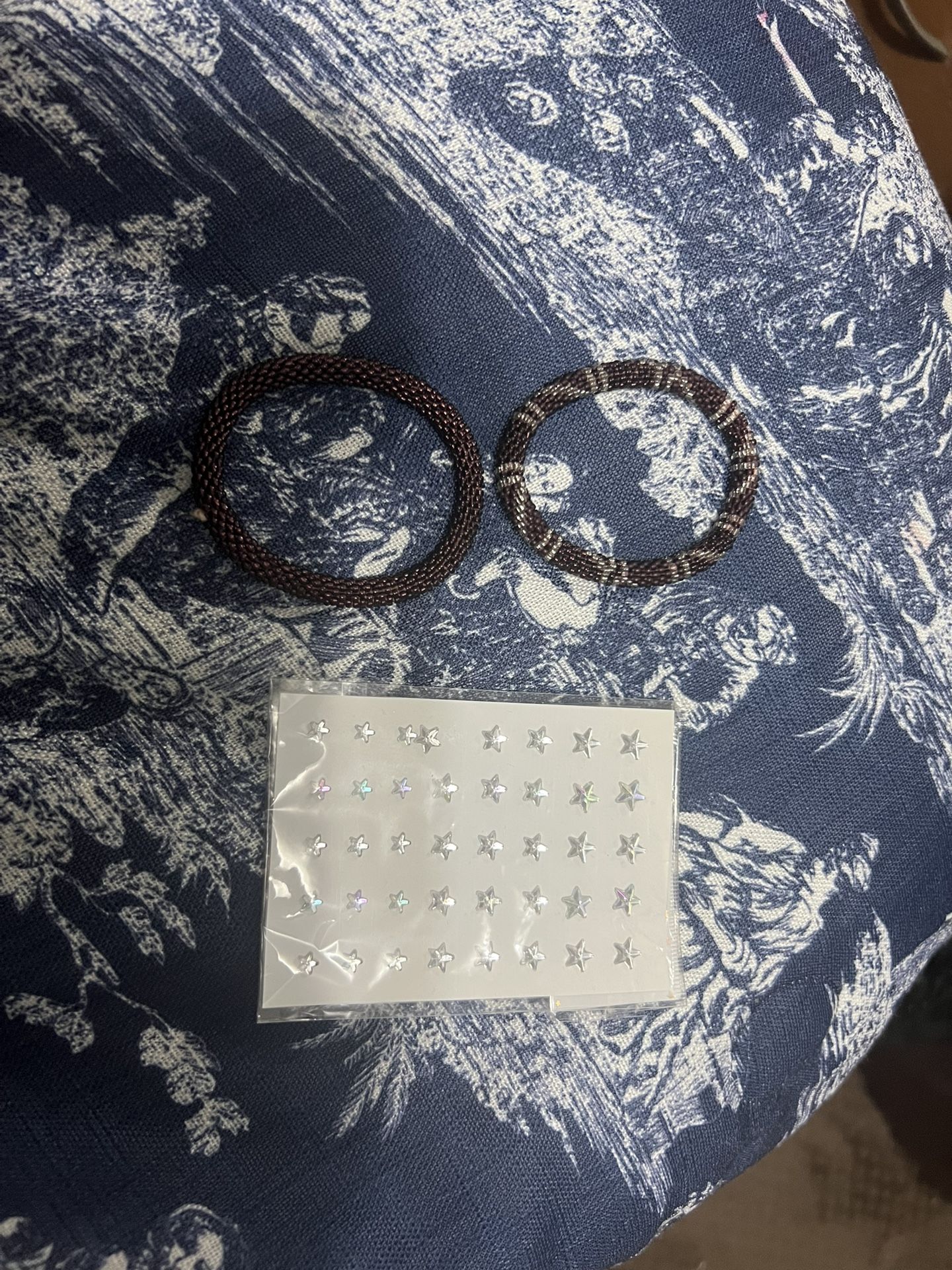Burgundy beaded bracelets + face star stickers