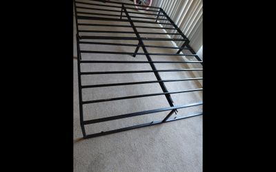Metal bed frame Full Queen no box spring  needed used pick up Still available
