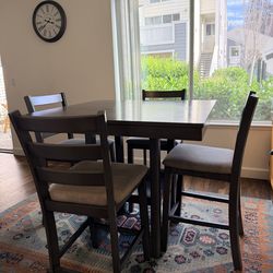 Wooden square dining table with 4 chairs