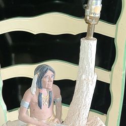 RARE 1982 APSIT BROS LAMP INDIAN HOLDING A GUN SITTING ON TREE WITH GOODS.(Make Me A Offer All Incan Do Is Say Yes Or No)