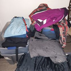 Hundreds Of Pairs Of Snow Clothes Jack It's Pants Bibs And Snowboarding Pants Some Boots All In Like New Condition