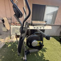  elliptical machine, also known as an elliptical trainer or cross-trainer.  