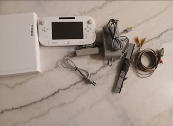 Wii U with 2 wii controllers, one wiiu pro controller, one nunchunk, and one zapper