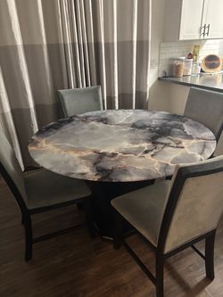 Glass and black wood dining table