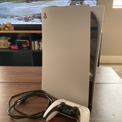 PS5 Disc Edition (CFI-1215A) + DualSense + power cable.