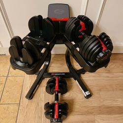 New Pair Of Authentic Bowflex Adjustable Dumbbells With Media Stand
