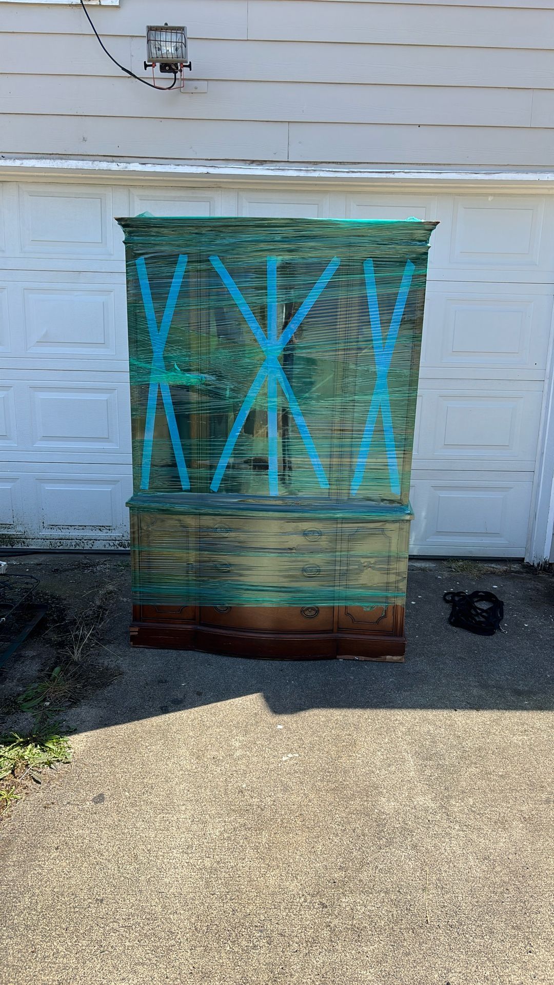 Beautiful antique hutch, brown with shelves glass doors three drawers need gone ASAP will not fit in new house wrapped and ready to go