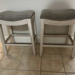 2 Farmhouse Distressed Bar Stools (25”h x 19”w x 12”d) Price is for both stools.