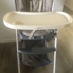 Baby Chair In perfect Condition It Folds In Half.