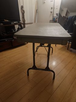 4 feet by 28inch  heavy duty  folding table