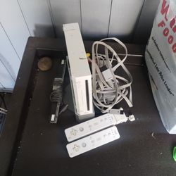 Nintendo wii with controllers.