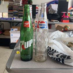 Old-School Pepsi And 7-Up Bottles