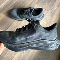 Black Nike running shoes