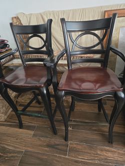 Two high back chairs