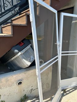 Double aluminum hinged screen doors