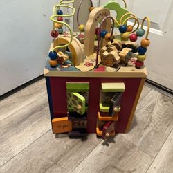 B. Toys Wooden Baby Activity Cube Zany Zoo