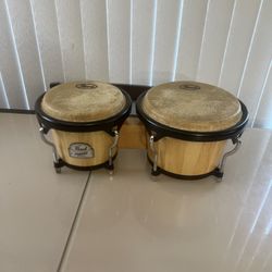 Pearl Percussion Primero Series Bongo Drums - Made in Thailand Hand Percussion. Used in good condition with some cosmetic blemishes. There blemishes a