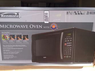 New in box Microwave oven