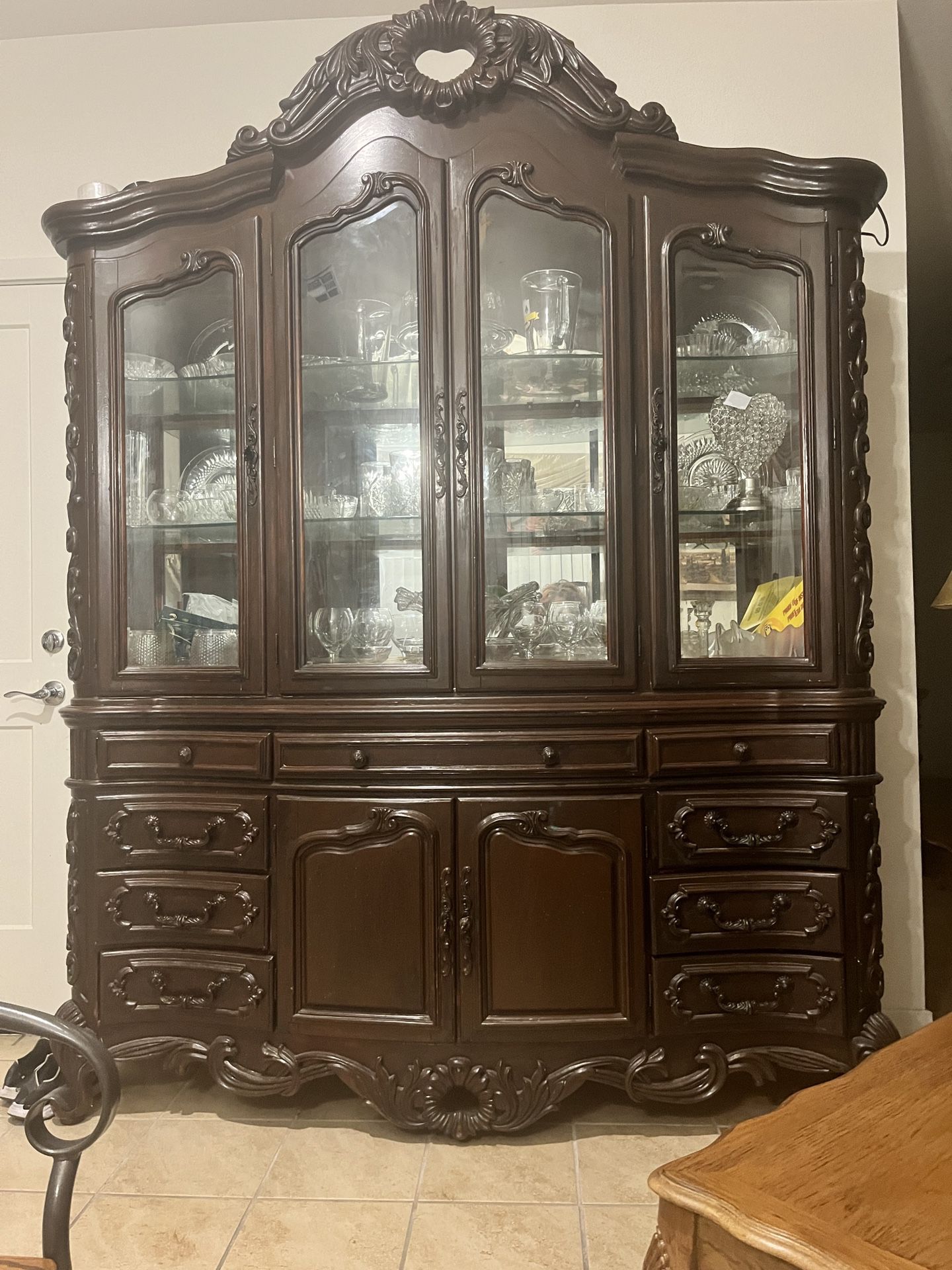 Beautiful Wooden China Cabinet In Great Conditions, There’s Nothing Broken, I am moving out and I am selling all my furnitur