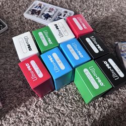 Huge yugioh collection  There is probably nearly 1.5k of holographic cards, and a couple hundred non holographic cards, as the cards in the tins are t