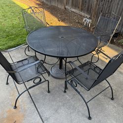 Vintage Wrought Iron 44” patio Table, 4 Rocker Chairs & Umbrella Stand  Price is firm, pick up in Rocklin, no holds, cash only