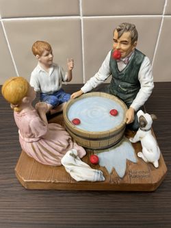 Vintage 1982 Norman Rockwell Figurine "Bobbing for Apples" Made in Japan This figurine is 4.5" tall and 5.5" x 5" Wide Excellent Vintage condition!  N