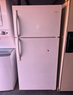 White Frigidaire Refrigerator And Freezer