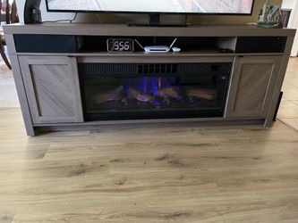 TV stand with fireplace and Bluetooth speakers