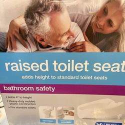 New Raised Toilet Seat